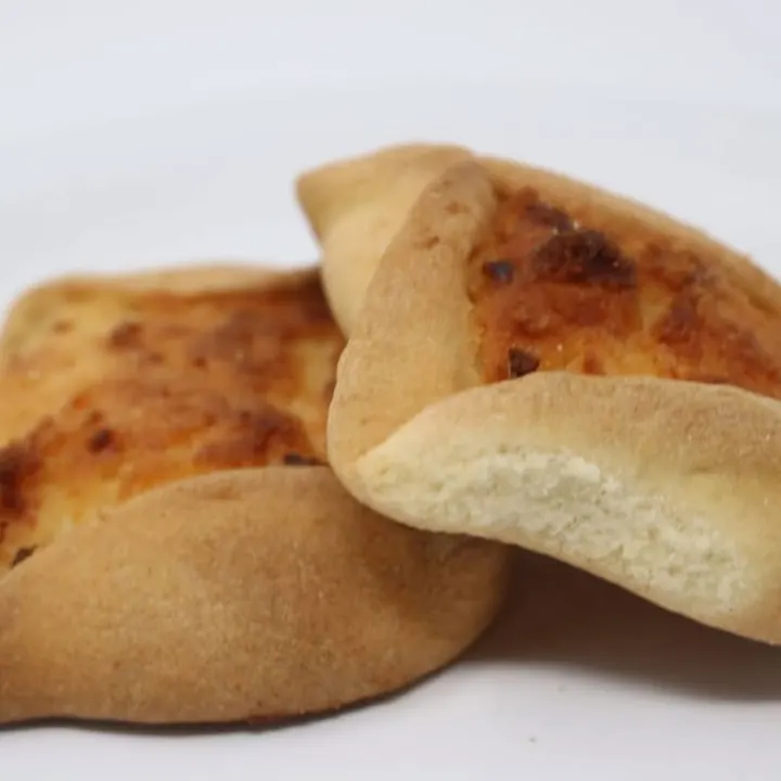 Golden Salvadoran sweet breads split open