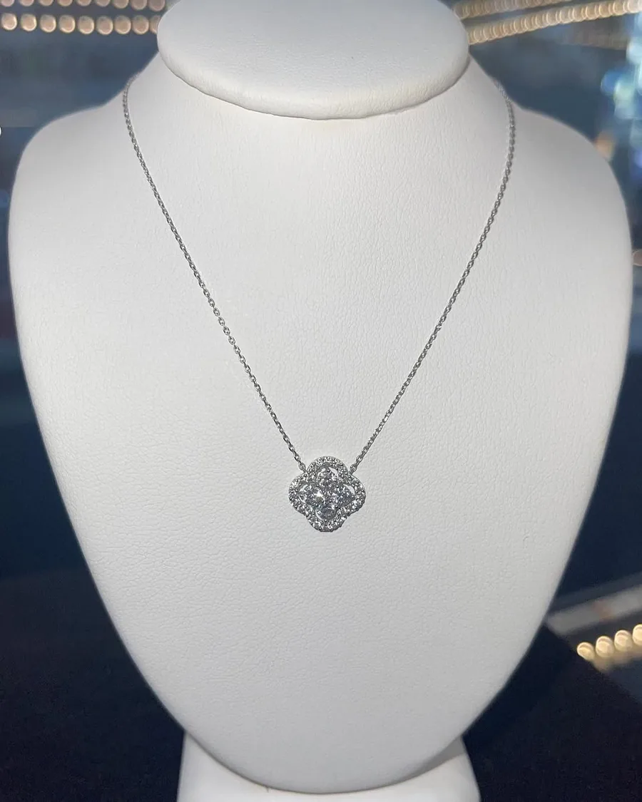 White-gold necklace with a crystal four-leaf clover pendant
