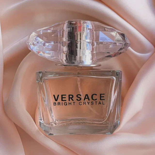 Versace Bright Crystal perfume bottle on satin