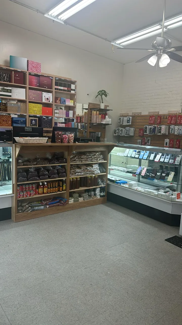 Inside Urquiza Variedades in Westbury: shelves of Salvadoran products, gift boxes and phone accessories